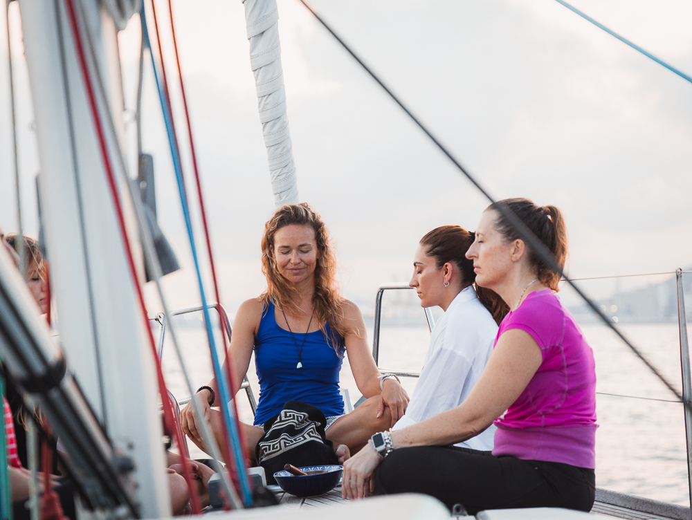 Guided meditation on a sailboat during the Soul Sailing Experience